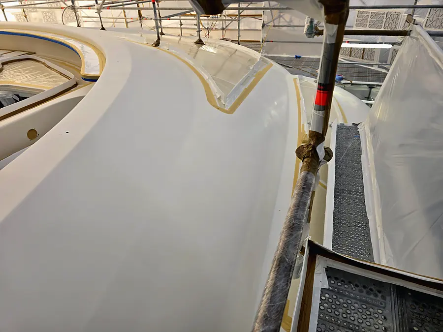 Hull curve masked with fine line tape inside the containment tent