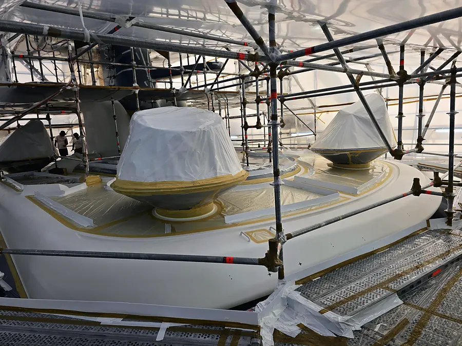 Masked radar domes and deck on a superyacht refit